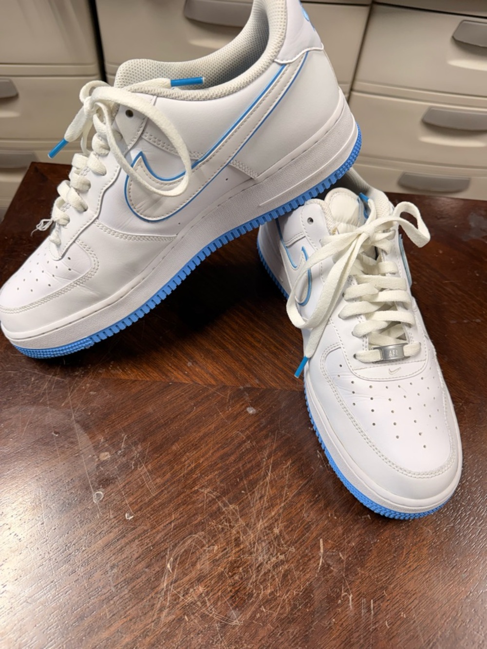 Nike White Sneakers with Light Blue Accents